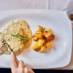 Hotel Cavallino S'Roessl Готель