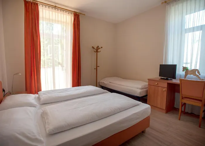 Otel Cavallino S'roessl Merano