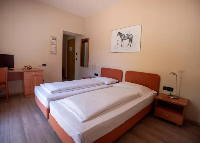 Cavallino S'roessl Hotel