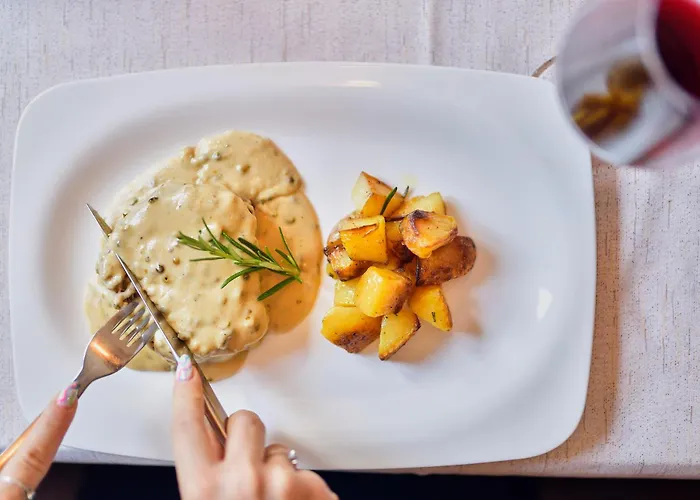 Cavallino S'roessl Otel