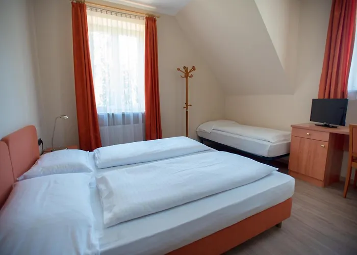 Otel Cavallino S'roessl 3*